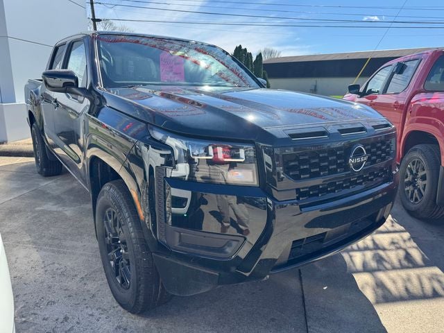 2026 Nissan Frontier SV in Super Black — front three-quarter view
