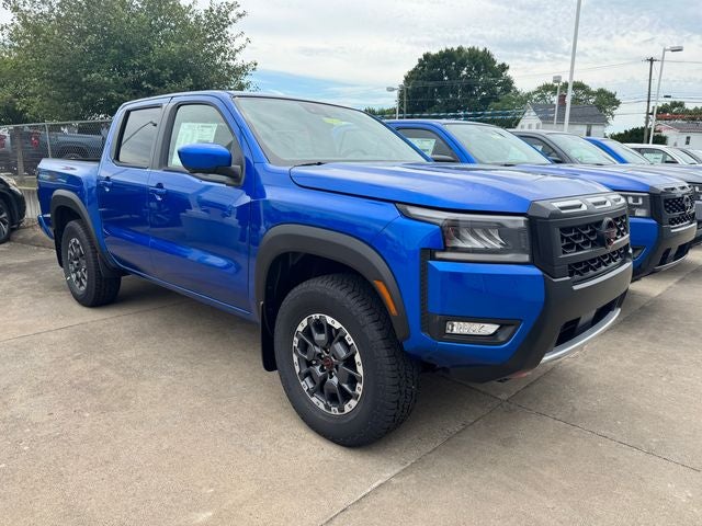 2026 Nissan Frontier PRO-4X in Bluestone Pearl — front three-quarter view