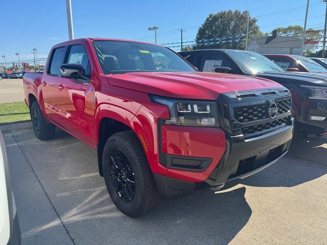 2026 Nissan Frontier SV in Red Alert — front three-quarter view