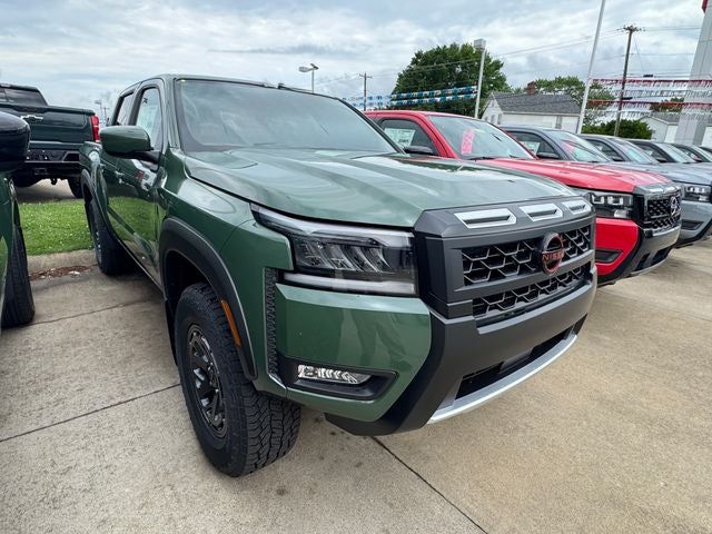 2026 Nissan Frontier PRO-4X in Tactical Green Metallic — front three-quarter view