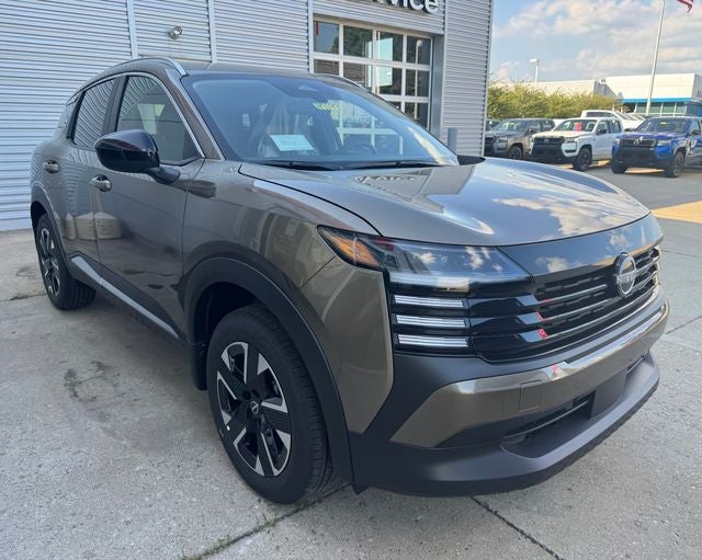 2026 Nissan Kicks SV in Canyon Bronze Metallic — front three-quarter view