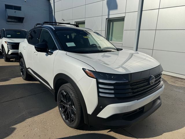 2026 Nissan Kicks SR in Aspen White/Super Black — front three-quarter view