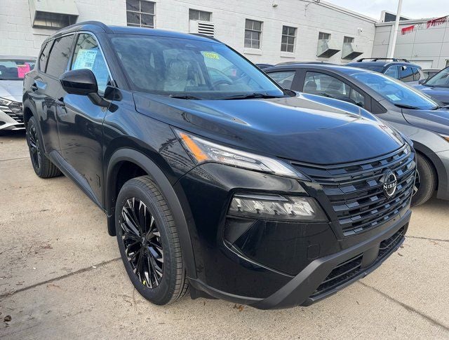2026 Nissan Rogue Dark Armor in Super Black — front three-quarter view