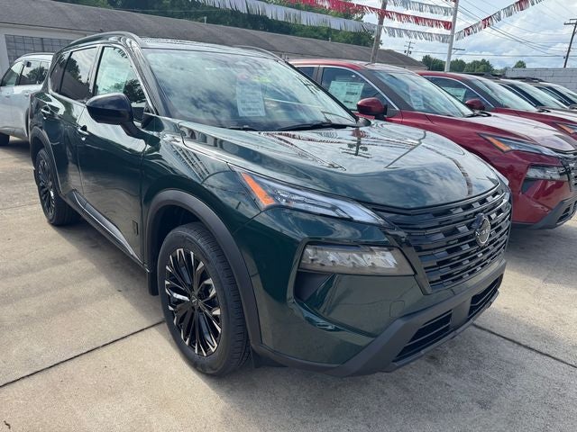 2026 Nissan Rogue Dark Armor in Obsidian Green — front three-quarter view