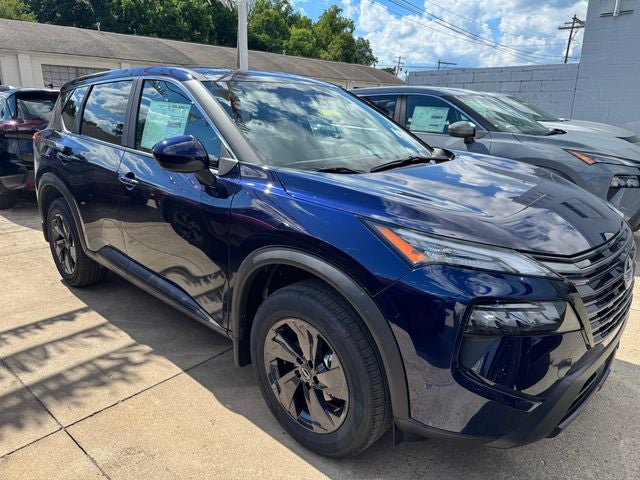 2026 Nissan Rogue SV in Deep Ocean Blue Pearl — front three-quarter view