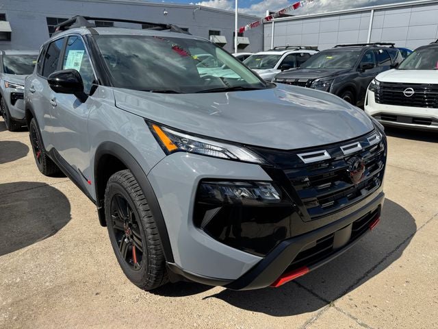 2026 Nissan Rogue Rock Creek in Boulder Gray Pearl — front three-quarter view