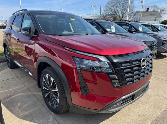 2026 Nissan Pathfinder Platinum in Scarlet Ember/Super Black — front three-quarter view