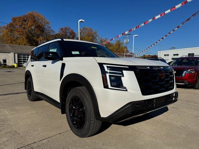 2026 Nissan Armada PRO-4X in Aspen White Tricoat — front three-quarter view